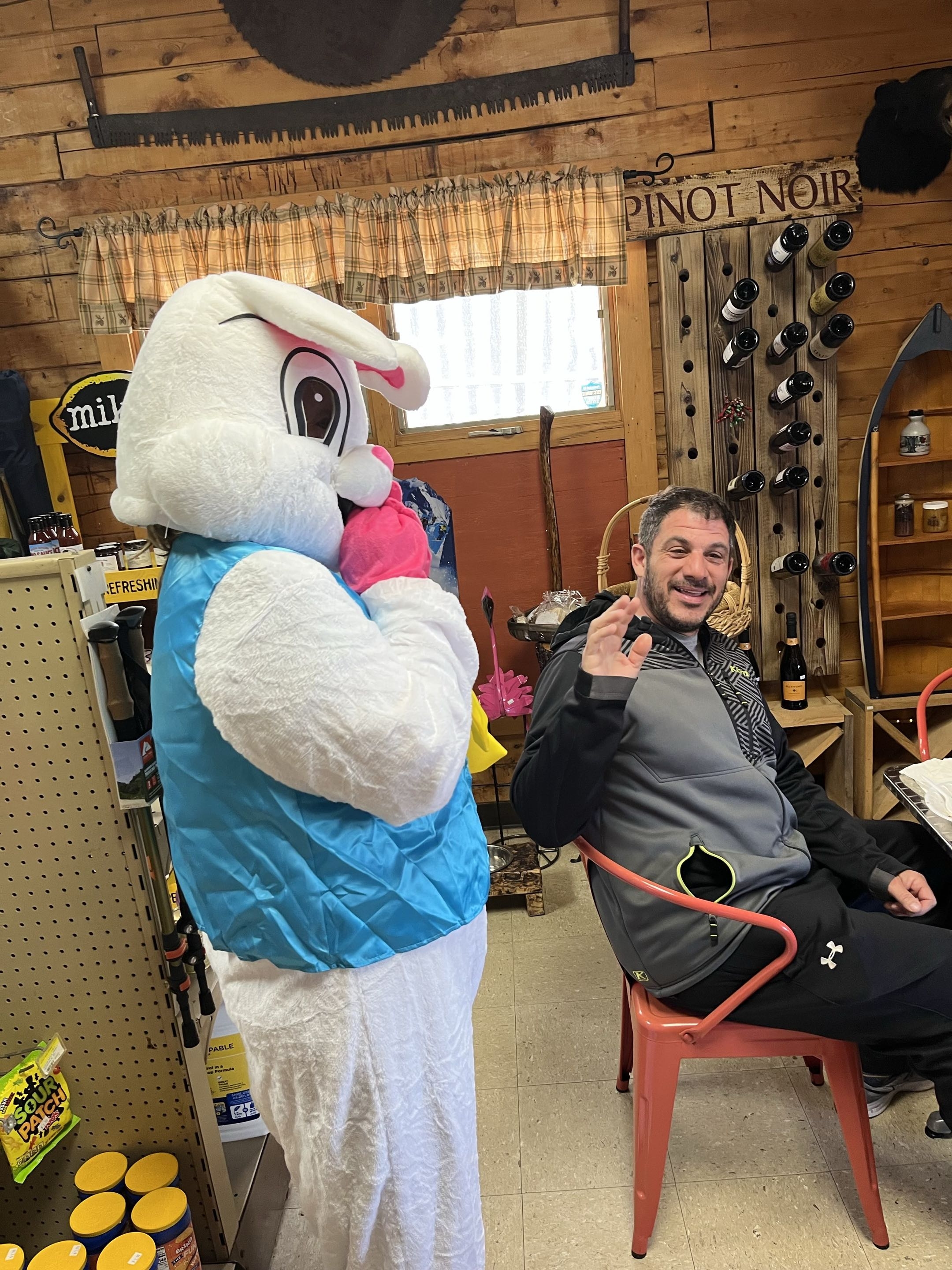 Franco Jr with the Easter Bunny inside the store